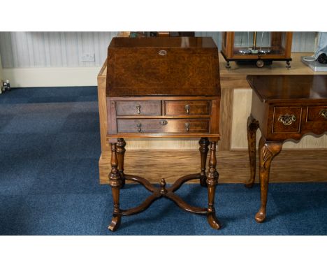Good Quality Reproduction Writing Bureau.  Slope opens to reveal 8 drawers, legs supported on nice gallery.  Attractive item,