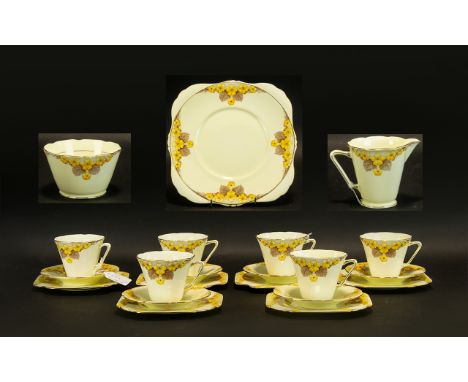 Grafton China, Art Deco Conical Shaped Tea Service "Aston" Primrose Pattern To Include Six Trios, Sugar, Cream And B&amp;B Pl