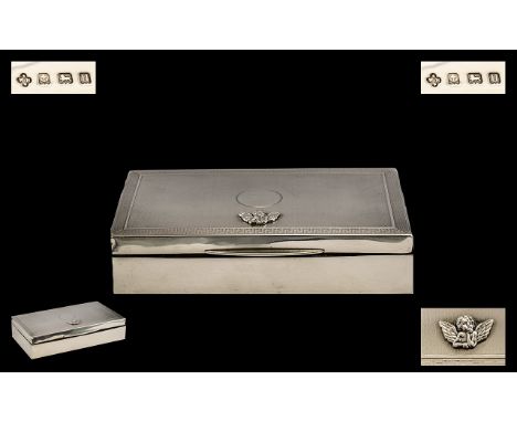 A Silver Cigarette Case engine turned, hinged cover. Cedar lined Hallmarked for Birmingham U 1944. 6 x 3½ Inches