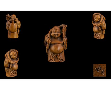 Japanese 19th Century Top Quality Signed Carved Boxwood Netsuke ' Laughing Buddha ' Carrying Fruit to His Back, Signed to Und