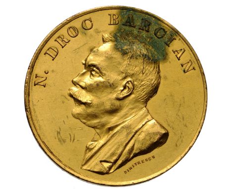  Prof. N. Droc Barcian from his Former Students .Medal 1900, signed by Fessler, gilt Bronze (36 mm, 20.48 g). VF+