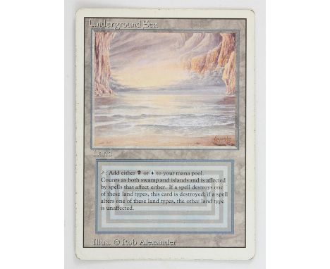 Magic The Gathering - Underground Sea - Revised (1994)This card is in Played condition. It has black dots around the front bo
