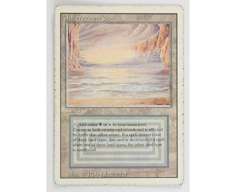 Magic The Gathering - Underground Sea - Revised (1994) This card is in Poor condition. It has black dots around the front boa