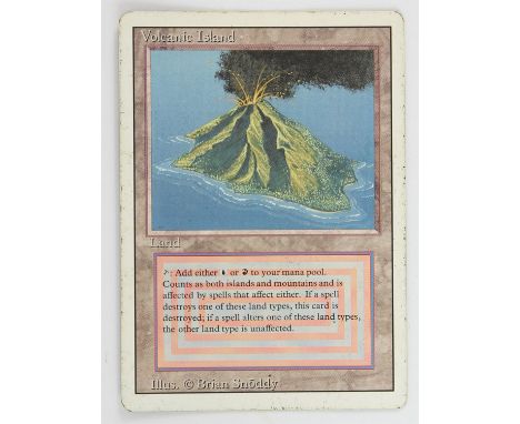 Magic The Gathering - Volcanic Island - Revised (1994) This card is in Poor condition. It has black dots around the front boa