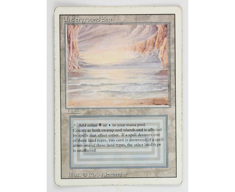 Magic The Gathering - Underground Sea - Revised (1994) This card is in Poor condition. It has black dots around the front boa
