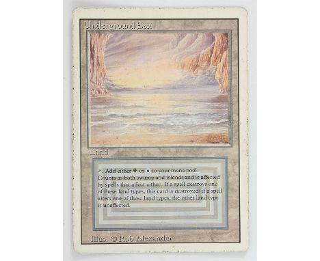 Magic The Gathering - Underground Sea - Revised (1994) This card is in Poor condition. It has black dots around the front boa
