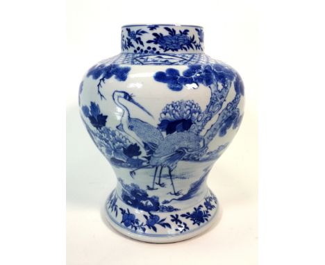 painted with two storks, pseudo Kangxi mark,   30cm high   