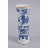 A CHINESE BLUE AND WHITE PORCELAIN TRUMPET VASE, decorated with kylin and phoenix, 24cm high.