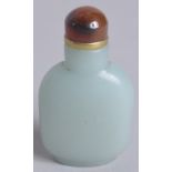 A 20TH CENTURY CHINESE JADE MINIATURE SNUFF BOTTLE, and agate stopper, 5.5cm.
