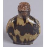 A 19TH CENTURY CHINESE TORTOISESHELL SNUFF BOTTLE, 6cm high.