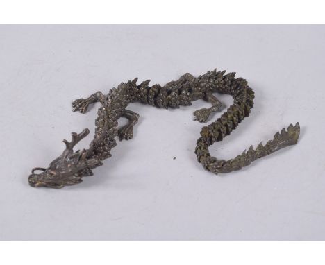 AN ARTICULATED BRONZE OKIMONO OF A DRAGON, 39cm long.