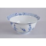 A CHINESE KANGXI PERIOD BLUE AND WHITE PORCELAIN BOWL, painted with female figures and boys, the