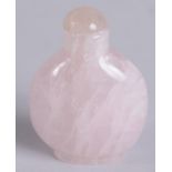 A 20TH CENTURY CHINESE ROSE QUARTZ SNUFF BOTTLE, 6cm high.