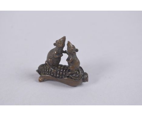 A BRONZE OKIMONO OF TWO RATS ON A CORN COB.