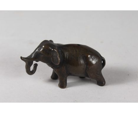 A JAPANESE MEIJI PERIOD BRONZE ELEPHANT WATER DROPPER, 9cm long.