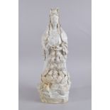 A LARGE 20TH CENTURY CHINESE QINGBAI POTTERY GUANYIN, 51cm high.