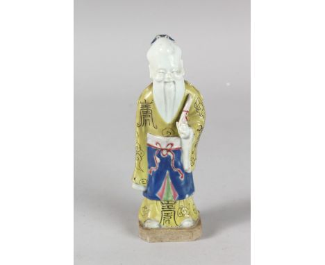 A 19TH CENTURY CHINESE POLYCHROME GLAZED POTTERY FIGURE OF A SAGE, 19cm high.