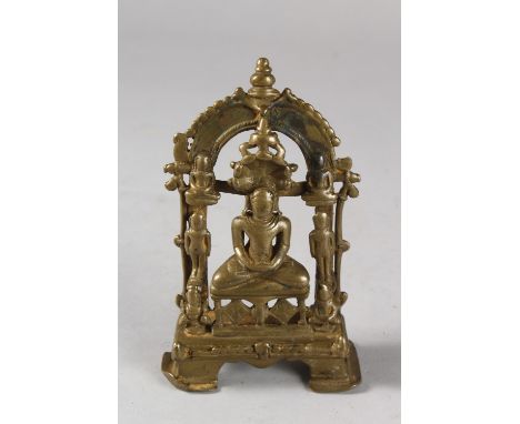 A RARE AND FINE 14TH CENTURY OR EARLIER SOUTH INDIAN BRONZE JAIN SHRINE, 14cm high.