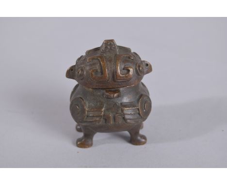 AN UNUSUAL BRONZE MINIATURE LIDDED CENSER, 5.5cm high.