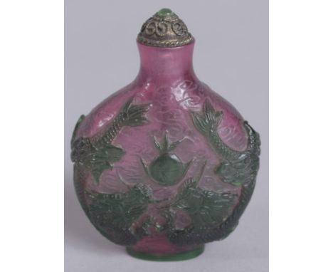 A 20TH CENTURY CHINESE TWO-COLOUR PEKING GLASS SNUFF BOTTLE, with twin dragons and the pearl of wisdom, 6cm high.