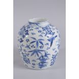 A 19TH CENTURY CHINESE BLUE AND WHITE PORCELAIN JAR, painted with birds and flora, base with