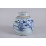 A 19TH CENTURY CHINESE BLUE AND WHITE PORCELAIN JAR AND COVER, with landscape scene, 17cm high.