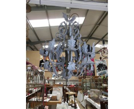 A wrought metal French style ceiling light
