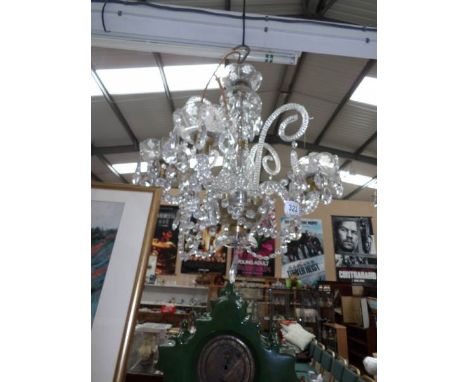 A 4 light glass chandelier