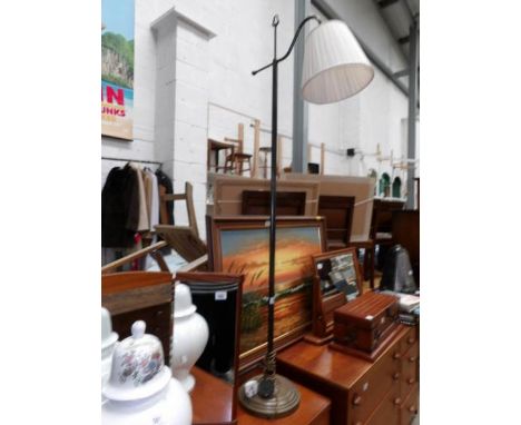 A brass standard lamp