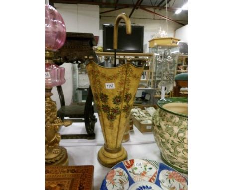 An umbrella shaped stick stand