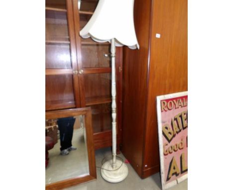 A shabby chic standard lamp