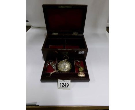 A pocket watch, 2 wristwatches and locket in a vintage jewellery box