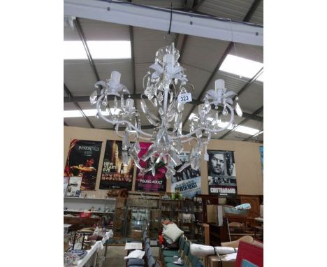 A 6 light glass chandelier
