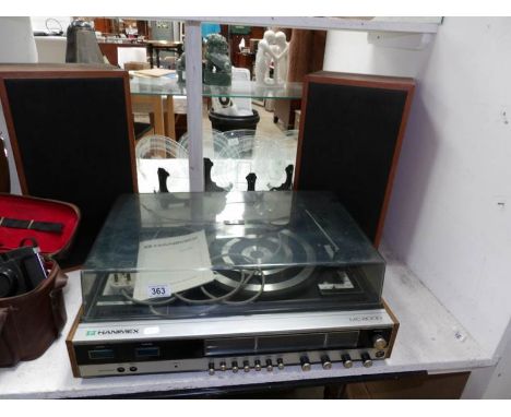 A Hanimex stereo record player with speakers