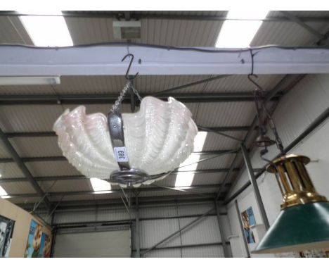 An Art Deco clam shell ceiling light