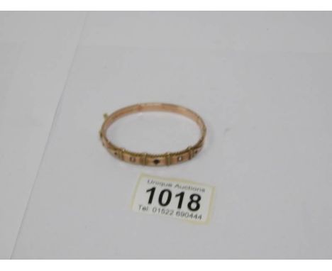 A rose gold bangle, a/f, 8 gms