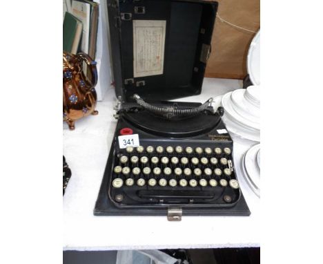 A vintage Remington portable typewriter in case