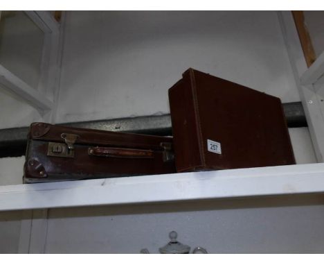 2 small vintage leather suitcases