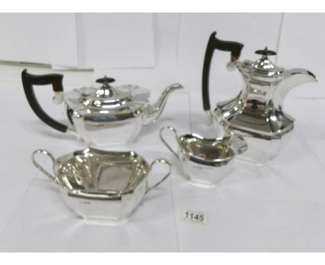 A 4 piece silver tea service, hall marked Sheffiled 1922/23, maker EV, total weight approx. 1780 grammes