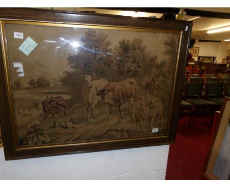A circa 1890 framed and glazed tapestry depicting cattle and sheep