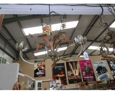 A wrought metal ceiling light