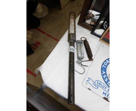 A thermometer and 2 Salter scales