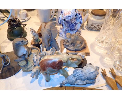Collection of mixed animal figurines in ceramic and resin 