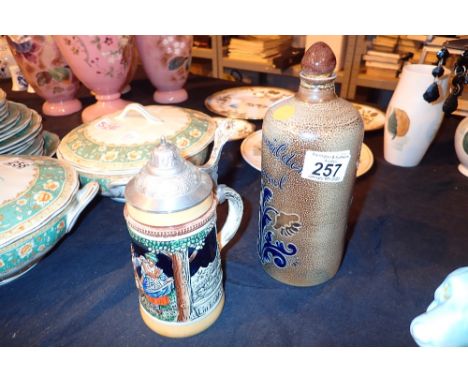 German stein and a glazed flask 