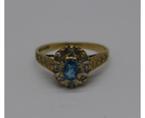 A 9ct gold, blue stone and diamond ring, 2.0g, N/O