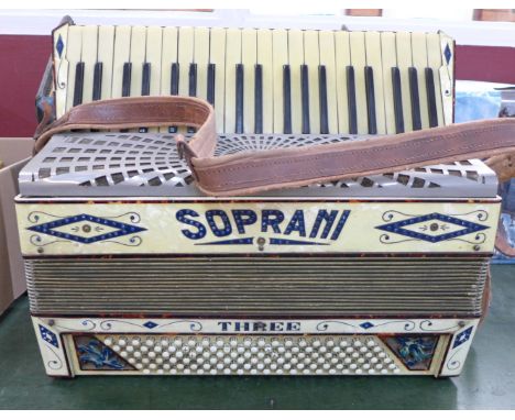 A Soprani piano accordion, cased