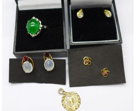 A 14ct gold pendant, 1.0g, three pairs of earrings including one 9ct gold, one with fasteners marked 9ct and one pair of scre