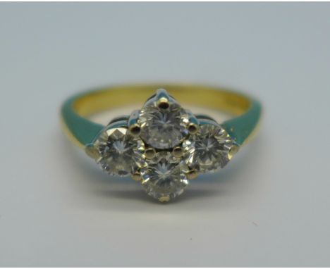 An 18ct gold, four stone diamond ring, over 1 carat total diamond weight, 4.7g, O