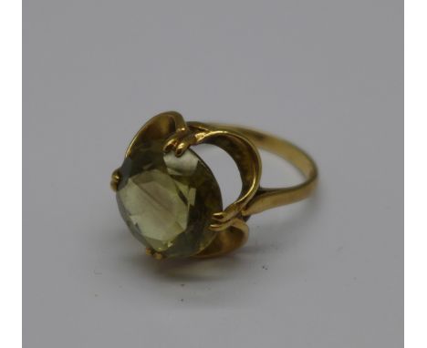 A 9ct gold, yellow stone ring, 3.7g, O