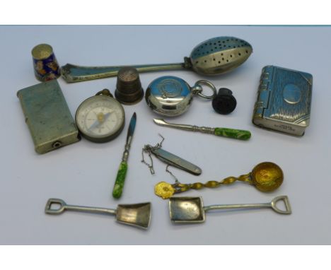 A sovereign case, vesta cases, compass, etc.